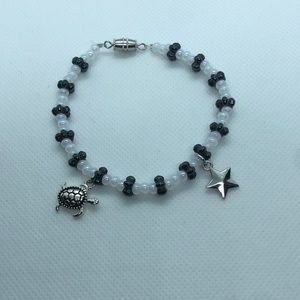 hematite beaded with turtle and star charm (handmade)